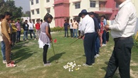 Mr. Anil Agarwal golfer of the city giving tips to students