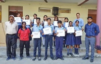 Students with olympiad medals and certificate