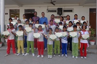 Students with olympiad medals and certificate